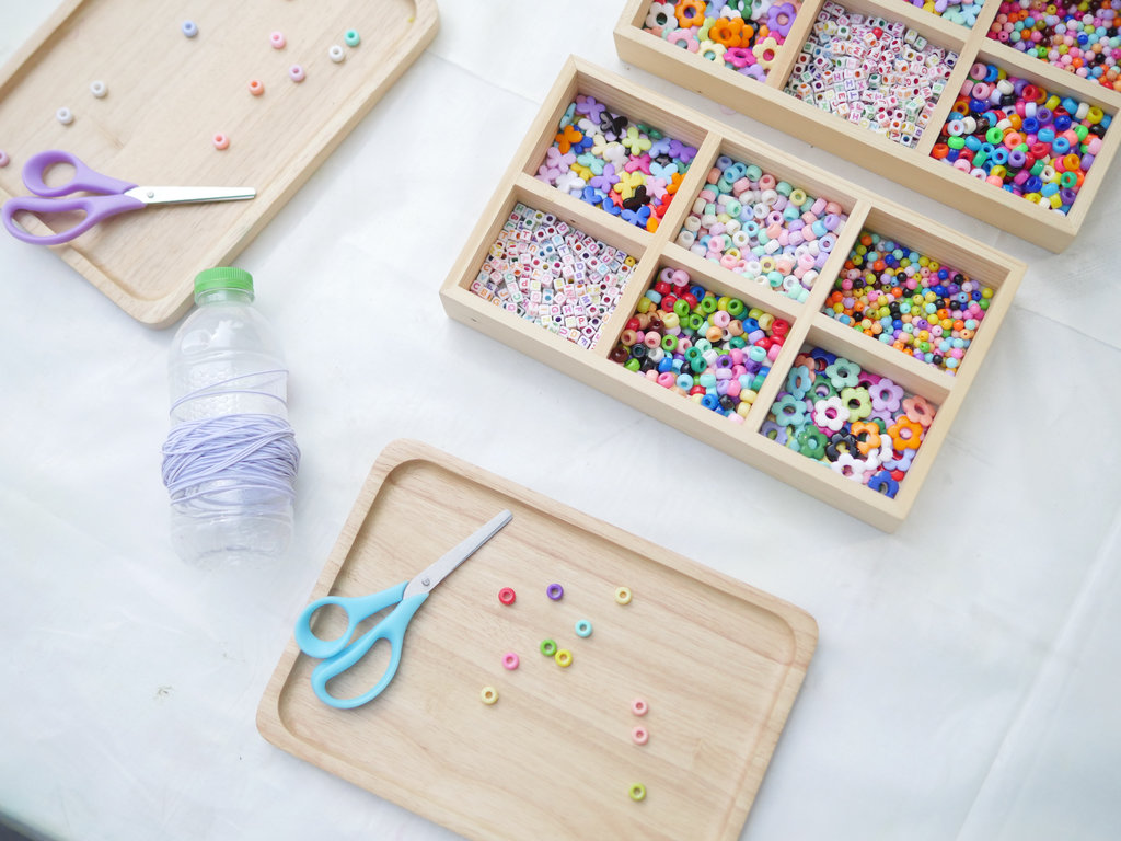 Hands arranging flowers
